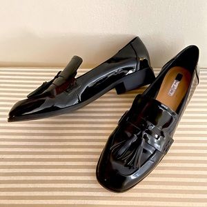 Black patent loafers